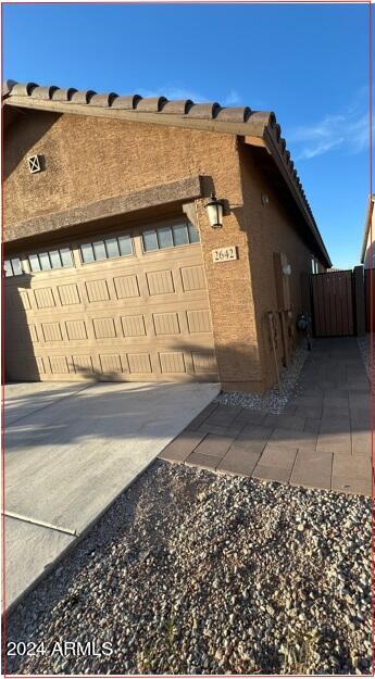 view of home's exterior featuring a garage