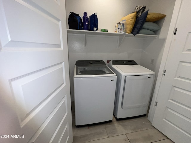 laundry room with washer and clothes dryer