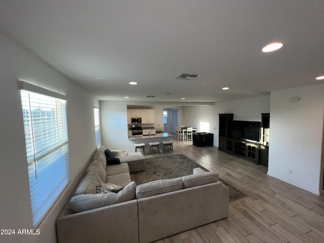 living room featuring light hardwood / wood-style floors