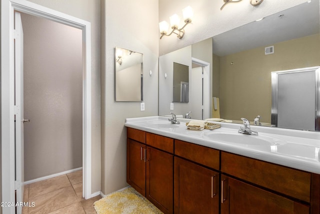 6745 N 93rd Ave Unit 1129, Glendale, AZ 85305 - full bathroom featuring double vanity and tile patterned floors