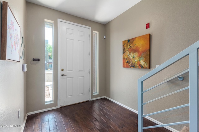 6745 N 93rd Ave Unit 1129, Glendale, AZ 85305 - entrance foyer featuring dark wood finished floors and baseboards