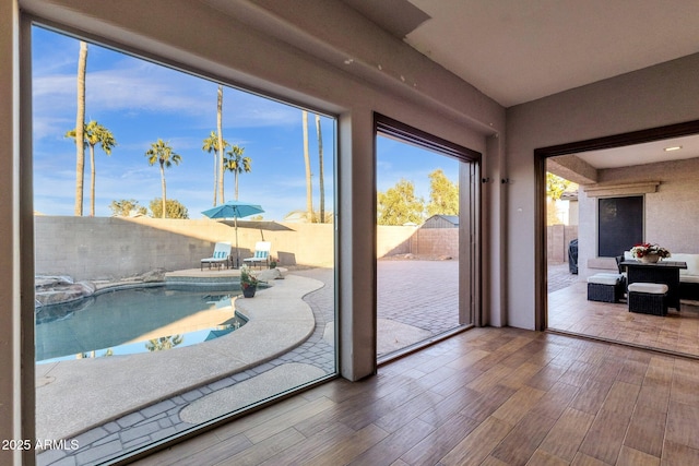 entryway with wood-type flooring