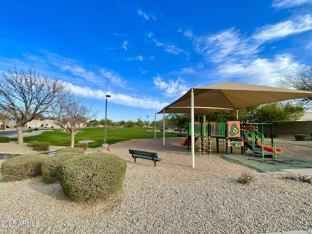 communal playground with a lawn