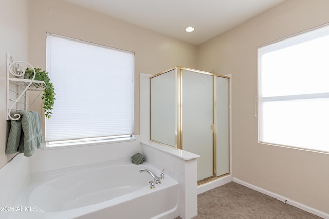 bathroom featuring independent shower and bath and tile patterned floors