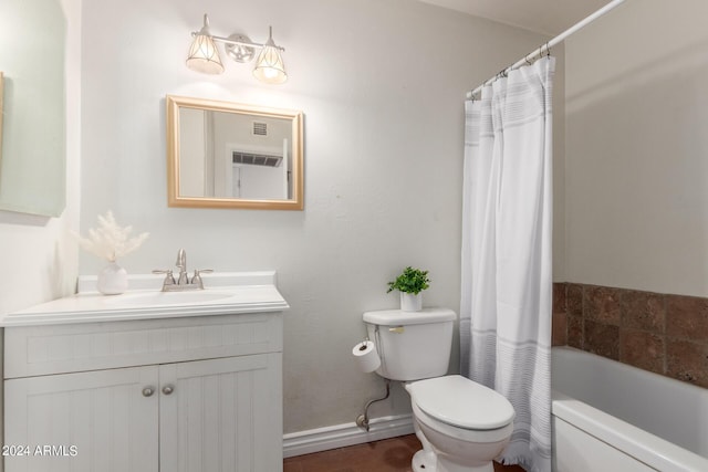 full bathroom featuring vanity, shower / bath combination with curtain, and toilet