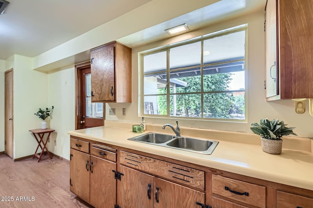 3944 E Oak St, Phoenix, AZ 85008 - kitchen featuring light wood-type flooring and light countertops