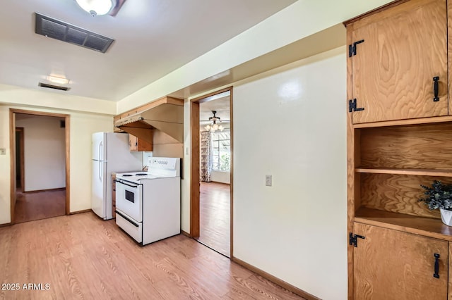 3944 E Oak St, Phoenix, AZ 85008 - kitchen with white appliances, light wood finished floors, and ceiling fan