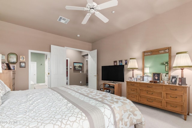 carpeted bedroom with lofted ceiling and ceiling fan