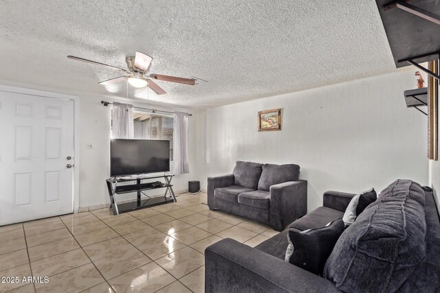 3702 W Sherman St, Phoenix, AZ 85009 - living area with a ceiling fan, tile patterned floors, and a textured ceiling