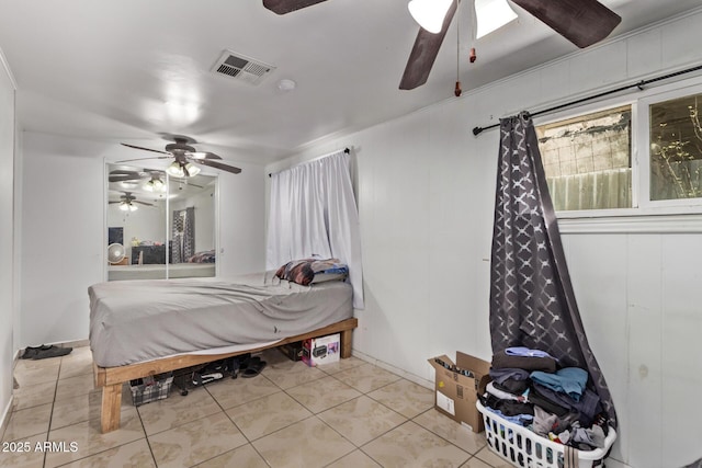 3702 W Sherman St, Phoenix, AZ 85009 - bedroom featuring light tile patterned floors and ceiling fan