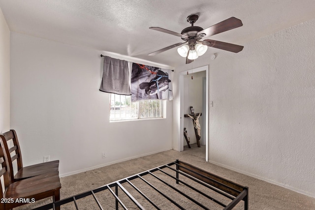 3702 W Sherman St, Phoenix, AZ 85009 - unfurnished bedroom with carpet flooring, a textured wall, a textured ceiling, and ceiling fan