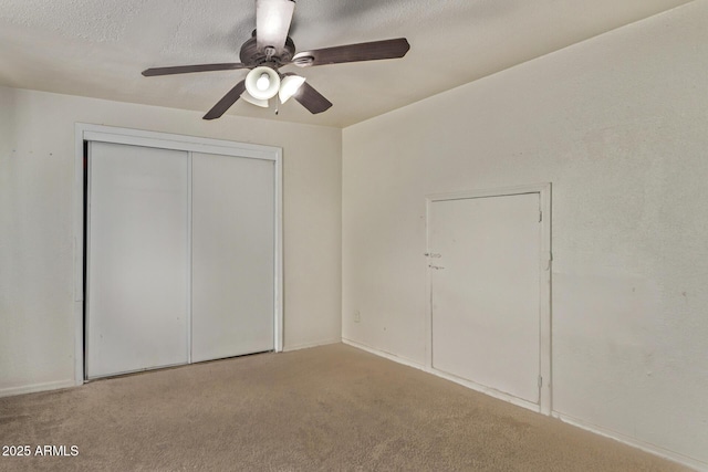 3702 W Sherman St, Phoenix, AZ 85009 - unfurnished bedroom featuring carpet, a closet, and a ceiling fan
