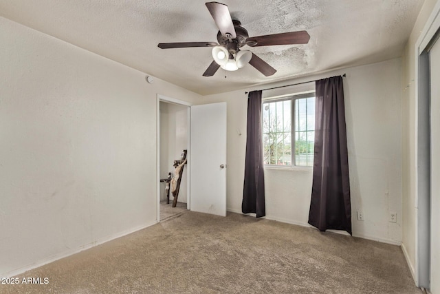 3702 W Sherman St, Phoenix, AZ 85009 - unfurnished room with ceiling fan, carpet flooring, and a textured ceiling
