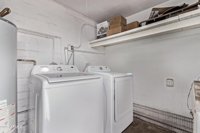 3702 W Sherman St, Phoenix, AZ 85009 - washroom featuring washing machine and dryer and water heater