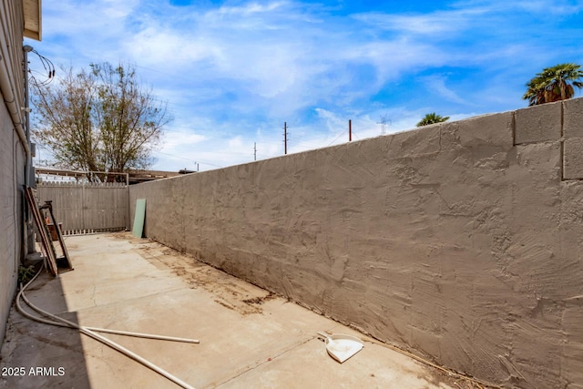 3702 W Sherman St, Phoenix, AZ 85009 - fenced backyard featuring a patio area
