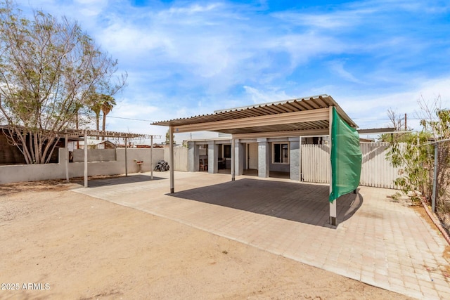 3702 W Sherman St, Phoenix, AZ 85009 - rear view of house with a fenced backyard and a patio