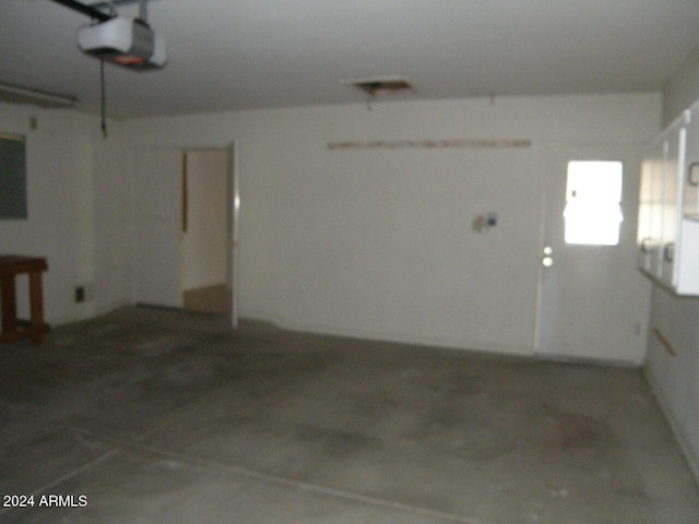 garage featuring a garage door opener