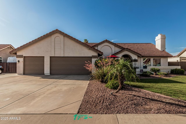 3054 E Norwood St, Mesa, AZ 85213 - view of front of house with stucco siding, an attached garage, concrete driveway, a chimney, and a tile roof
