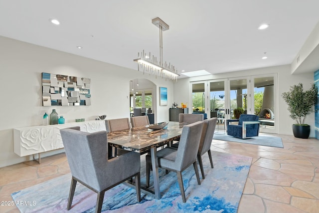 dining room with french doors and plenty of natural light