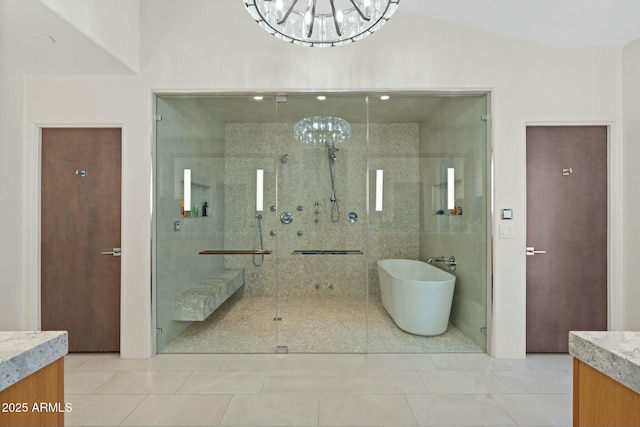 bathroom with tile patterned flooring, vanity, a notable chandelier, plus walk in shower, and vaulted ceiling