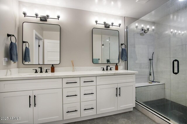 5441 E Wethersfield Rd, Scottsdale, AZ 85254 - full bath featuring a stall shower, baseboard heating, and double vanity