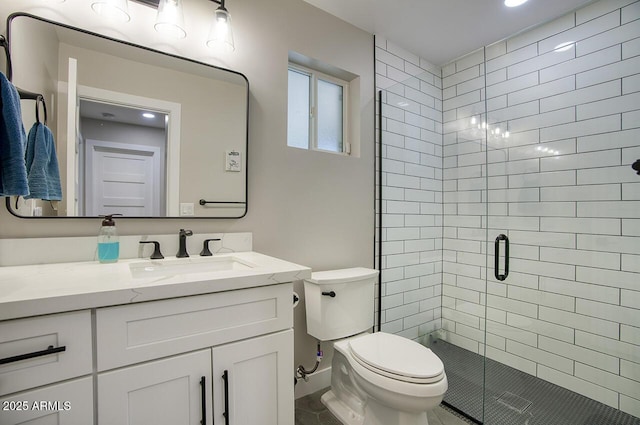 5441 E Wethersfield Rd, Scottsdale, AZ 85254 - full bathroom featuring toilet, a stall shower, vanity, tile patterned floors, and recessed lighting