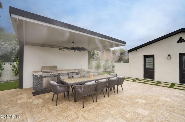 5441 E Wethersfield Rd, Scottsdale, AZ 85254 - view of patio / terrace featuring exterior kitchen, a ceiling fan, outdoor dining area, fence, and a grill