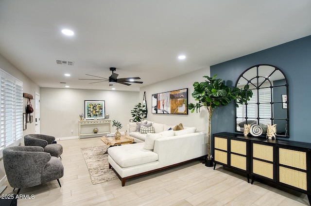 5441 E Wethersfield Rd, Scottsdale, AZ 85254 - living area with a ceiling fan, wood finished floors, recessed lighting, and baseboards