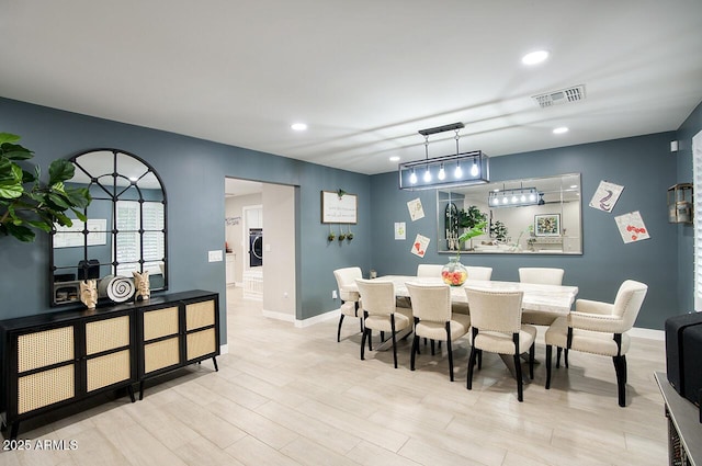 5441 E Wethersfield Rd, Scottsdale, AZ 85254 - dining area with recessed lighting, wood finished floors, and baseboards
