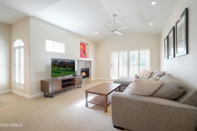 living room with light carpet, ceiling fan, and plenty of natural light