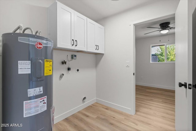 laundry area featuring cabinets, ceiling fan, light wood-type flooring, water heater, and hookup for an electric dryer