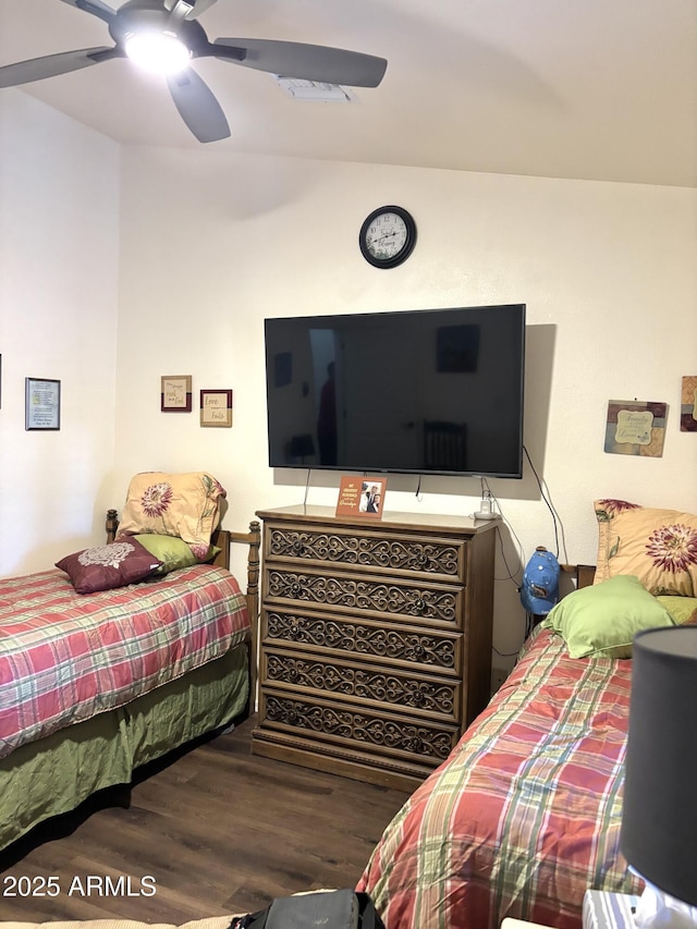 bedroom featuring hardwood / wood-style flooring and ceiling fan