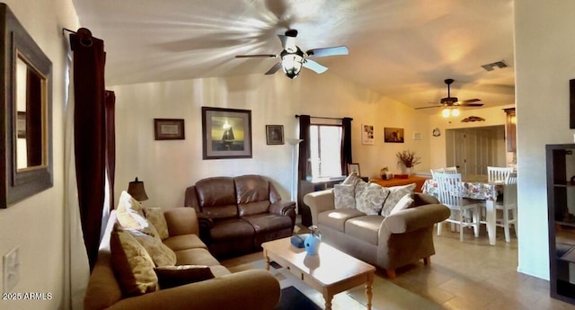 living room featuring vaulted ceiling