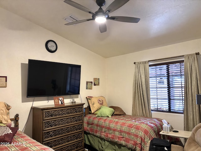 bedroom with ceiling fan and vaulted ceiling