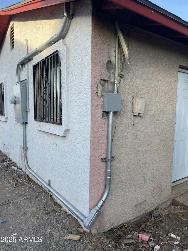 view of property exterior with stucco siding