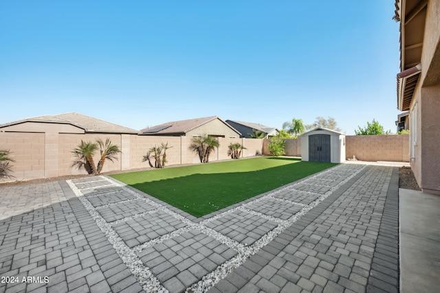 view of patio / terrace featuring a shed