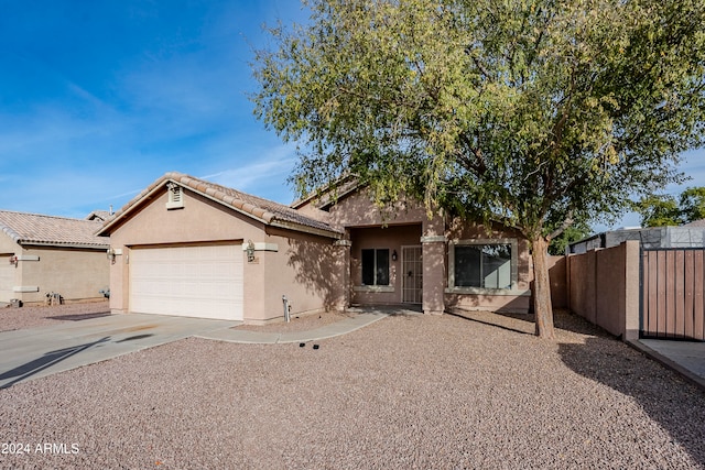 view of front of property featuring a garage