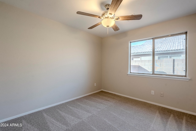 unfurnished room featuring carpet flooring and ceiling fan