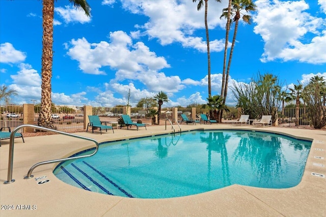 view of pool featuring a patio