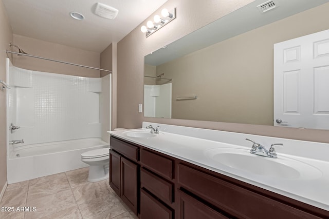 full bathroom featuring toilet, a sink, bathtub / shower combination, and visible vents