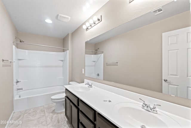 full bathroom with shower / bathtub combination, vanity, and toilet