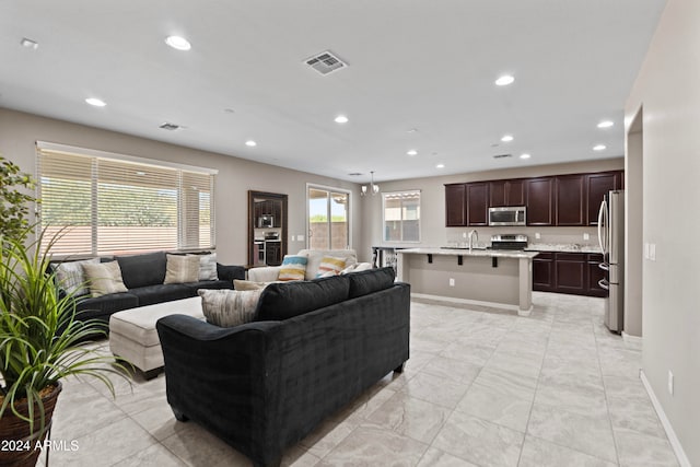 living room featuring sink