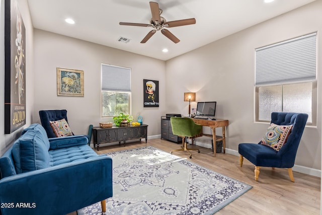 office featuring ceiling fan and light hardwood / wood-style floors