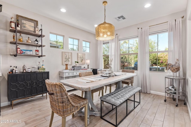 dining room featuring a notable chandelier