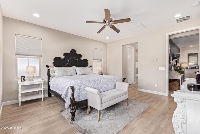 bedroom with ceiling fan and light hardwood / wood-style flooring