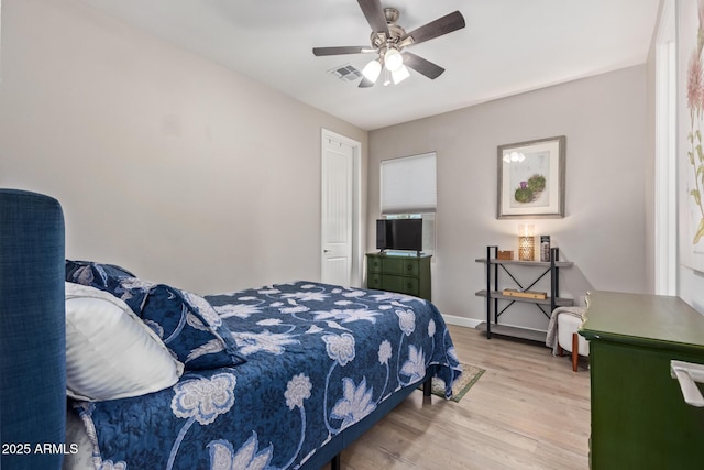 bedroom featuring ceiling fan and light wood-type flooring