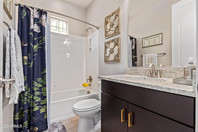 full bathroom featuring shower / bath combination with curtain, vanity, toilet, and hardwood / wood-style floors