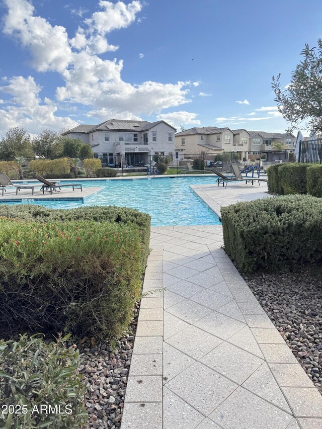 view of swimming pool with a patio area