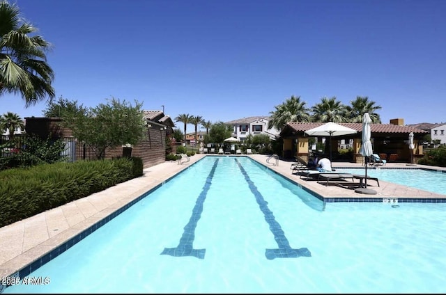 view of pool featuring a patio