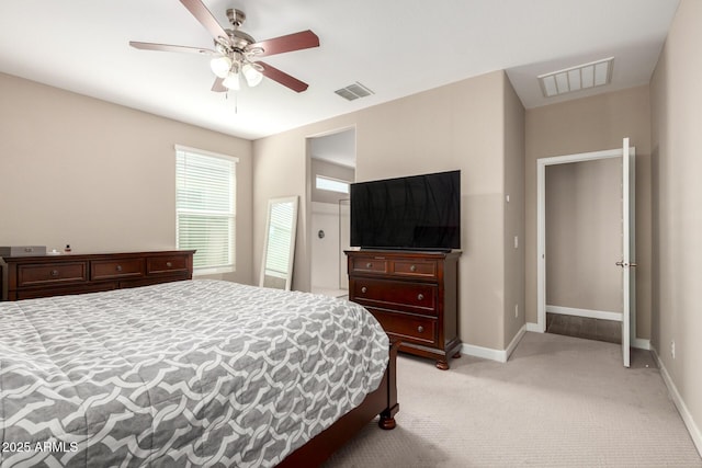 bedroom with visible vents, baseboards, ceiling fan, and light carpet